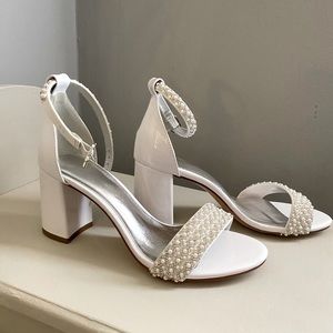 White pearl high heels with pearl wrapped ankle straps!